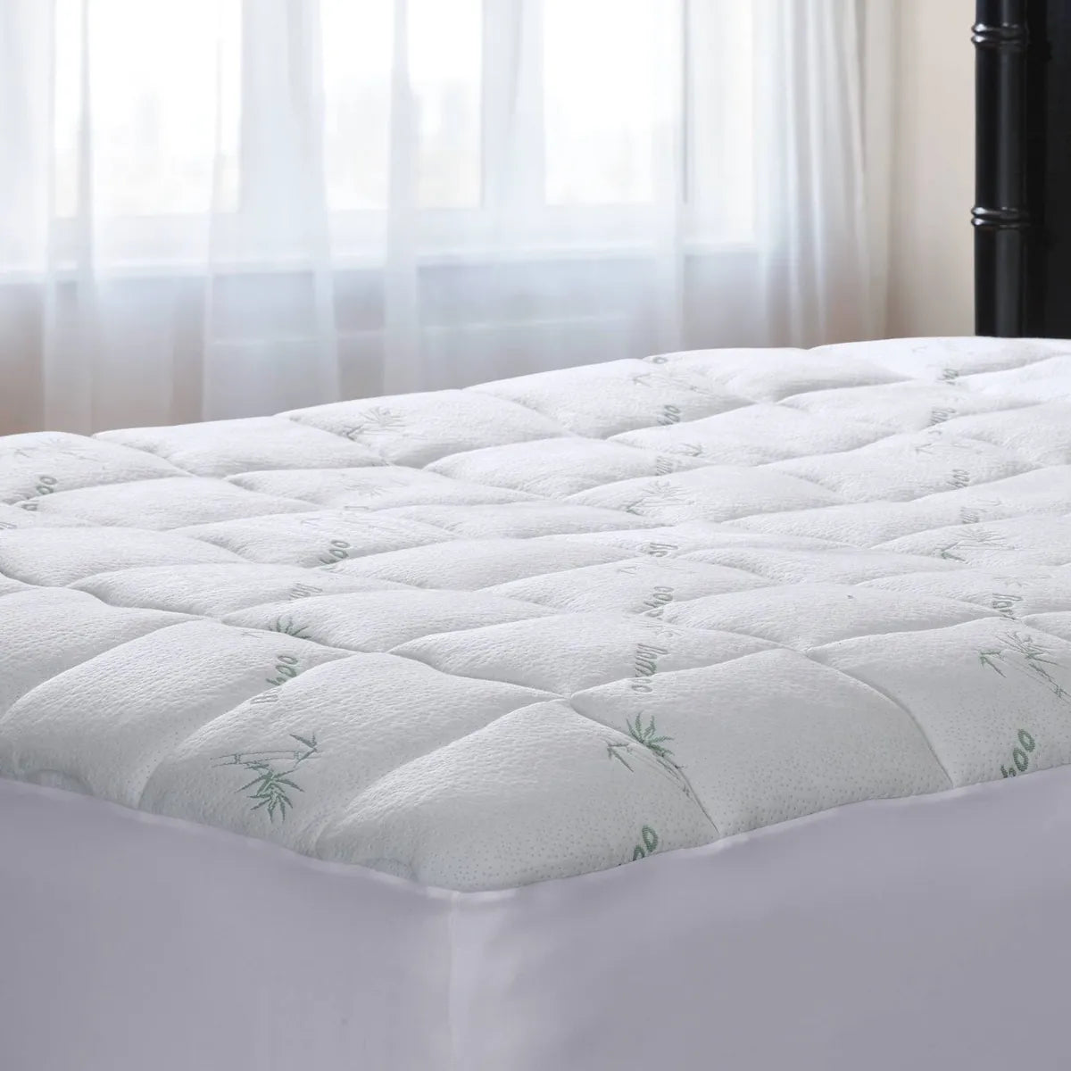 Protector de colchón impermeable con acolchado alto cubierta de bambú marca Cuddledown